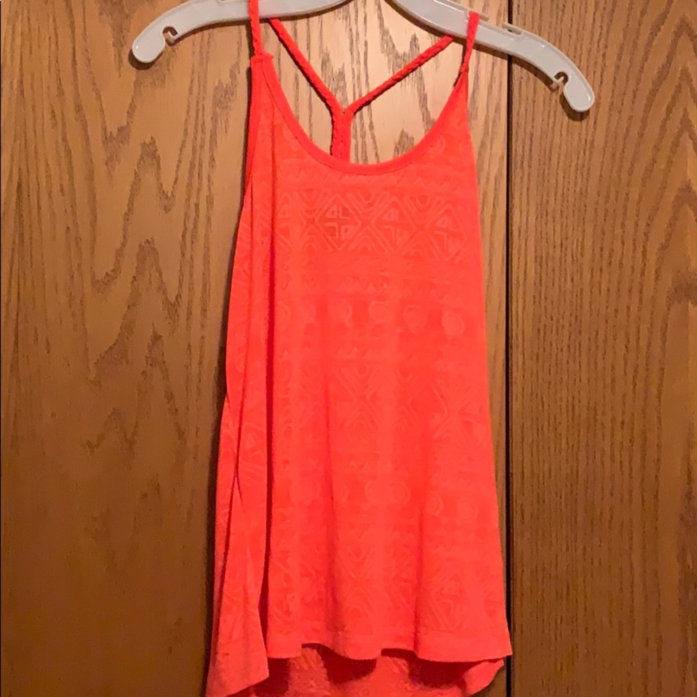Bright pink tank.